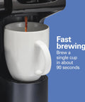 Solid Trio Coffee Maker Bundle Comes With Two Fresh Water Filter Pods And Swift Single Serve Option For Real Good Morning Coffee In Sleek Black Cabinet; brewing coffee into a white mug in 90 seconds.