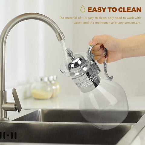 Heatable Turkish Teapot For Coffee And Tea With Lid Glass Water Kettle Pottery Ceramic Turkish Style Teapot Zinc Alloy Stove Ready For Hot Brews In The Kitchen being cleaned under a kitchen faucet