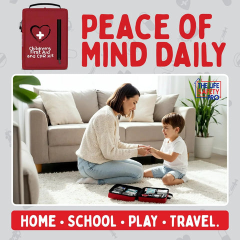 Red portable kids' first aid kit with CPR shield; two open cases on the living room rug.