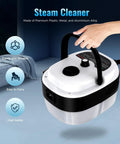 Hand holding Powerful 2500W Handheld Steam Cleaner with 6 Speed High Pressure Steam Cleaning in a room setting.