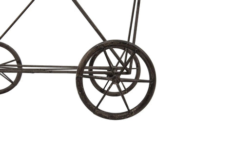 Close-up of wheel on Old School Vintage Metal Laundry Basket On Wheels With Durable Frame In Gray Finish, 25 By 15 By 26.75 Inches