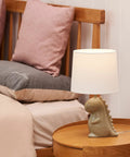 Tommy Dinosaur 16 Inch Ceramic Table Lamp In Green With White Cotton Shade Kid Friendly Nightstand Light For Kids Room Whimsical Decor