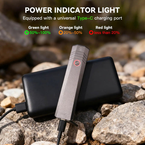 Rechargeable 1500 Lumen EDC Flashlight With 226 Meter Beam, IPX7 Waterproof, shown charging with USB-C on rocks.