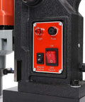 Control panel of Kickass 1100W Magnetic Drill Press with switches for light, magnet, and power settings.
