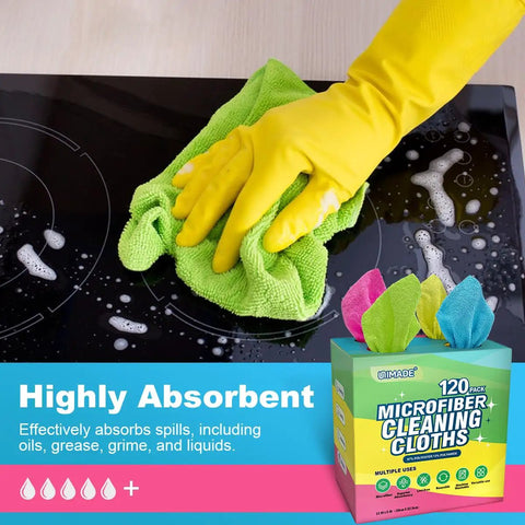 Person using a green microfiber cloth from a 120 Pack Microfiber Cleaning Cloths For Cars And Home Use Reusable Towels 11x9 Multicolor With Crazy Handy Dispenser Box Scratch Free Lint Free Washable Rags For Detailing And Polishing on a stovetop.