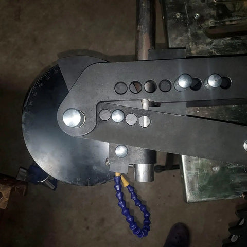 Premium Black Oxide Steel Manual Tube And Pipe Bender For Round Square Stock Heavy Duty Hand Bending Tool Ratcheting Handle close-up showing metal adjustment features.