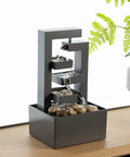Small Desktop Waterfall Fountain 9.65 Inches For Desk Zen Vibes And Relaxation, 3 Tier Stone Water Feature on wooden shelf