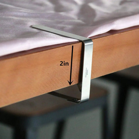 Heavy Duty Outdoor Tablecloth Clips Set Flexible Stainless Steel Picnic Table Clip Holders For Tables Up To Two Inches Thick Reusable 12 Pack Secure Indoor Or Outdoor Table Covers on table edge