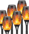 6 Pack Solar Flickering Flame Torches Waterproof Outdoor Garden Lights For Yards Patio And Pathway Decor With Realistic Flame Effect Easy Setup Dope Glow Sun Powered, showing warm flame effect