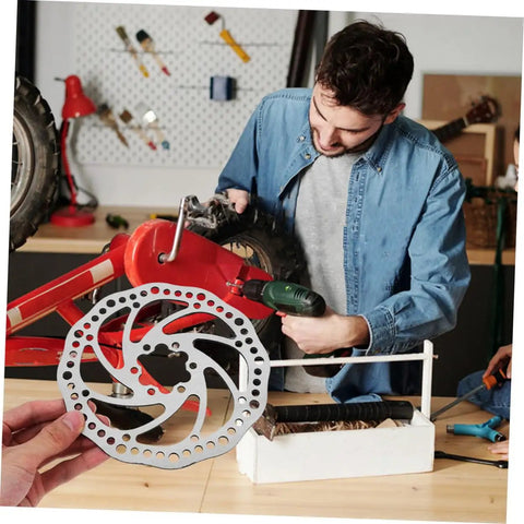 Radical Performance Mechanical Disc Brake Set For Mountain Bikes Front And Rear 160Mm Rotors shown with a mechanic installing it on a bike.