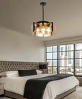 Get The Low On This Badass Matte Black 4 Light Adjustable Chandelier With Metal Frame To Drop Some Serious Glow Over Dining Tables Kitchen Islands Bedrooms Or Bathrooms Today in a modern bedroom.