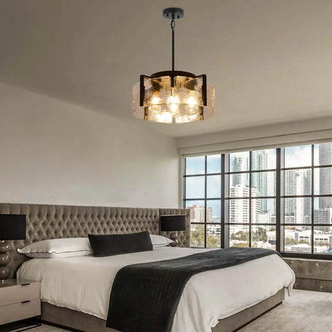 Get The Low On This Badass Matte Black 4 Light Adjustable Chandelier With Metal Frame To Drop Some Serious Glow Over Dining Tables Kitchen Islands Bedrooms Or Bathrooms Today in a modern bedroom.