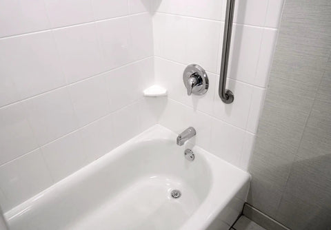 No Sweat Setup Twist Close Bath Waste And Overflow Kit Featuring Slick Leak Proof Design visible in a clean bathtub.
