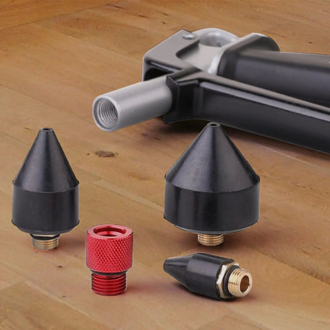 One Eighth Inch Rubber Tip Set For Air Blow Gun With One Half Inch High Flow Adapter Four Piece Nozzle Kit Featuring 15mm 24mm 35mm Rubber Tips And Brass Fittings For A Tight Universal Air Compressor Connection showing rubber tips and brass fittings on a wooden table