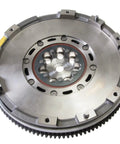 Heavy Duty Dual Mass Flywheel Direct Swap Fit 2009 Through 2013 Hyundai Kia Forte Optima Sonata Sportage Tucson 2.4 L R4 Straight Bolt On Shop Grade Drivetrain Unit close-up view showing detailed machining and surface finish.