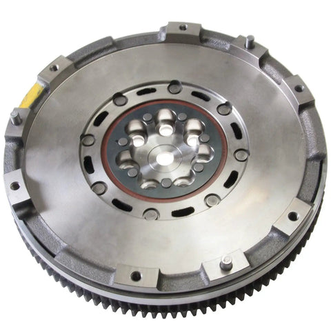 Heavy Duty Dual Mass Flywheel Direct Swap Fit 2009 Through 2013 Hyundai Kia Forte Optima Sonata Sportage Tucson 2.4 L R4 Straight Bolt On Shop Grade Drivetrain Unit close-up view showing detailed machining and surface finish.