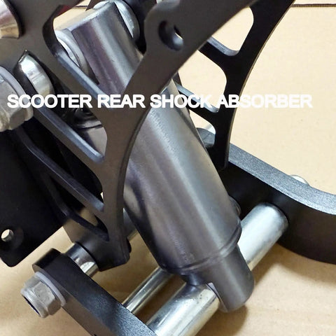 Beefed-Up Hydraulic Rear Shock Upgrade for Electric Scooters, Cylindrical Suspension Kit, close-up with metal components