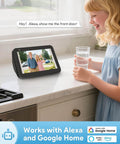 Girl using Alexa device to view footage from Wireless 2K HD Doorbell Camera With Ring Chime, No Wires Needed, Battery Powered.