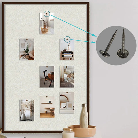 100 Count Mini Upholstery Nails Black Round Head Furniture Tacks used for hanging photos on a cork board.