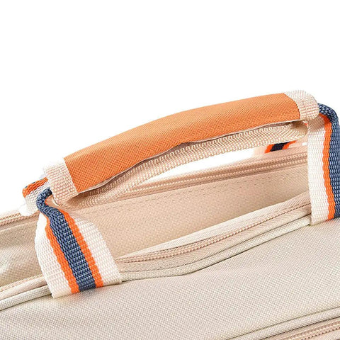 Close-up of the handle of No Fuss Insulated Picnic Backpack Set For Four, featuring orange and blue fabric detailing.