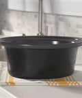 Removeable stoneware pot for Huge 7 Quart Manual Slow Cooker Serving As A Real Weeknight Hero With Removable Stoneware Pot, High And Low Settings Plus Auto Warm Mode, No Fuss Dishwasher Safe Cleanup, Charcoal Finish.