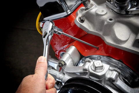 Mechanic using Long Length Hex Bit Socket Set for Three-Eighths Inch Drive, 6-Piece Metric Hex Sockets with S2 Steel Bits on engine.