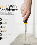 Using Six In One Screwdriver Kit With Comfortable Non Slip Grip as screw is driven into wood, showcasing the multi tool with nut driver bits.