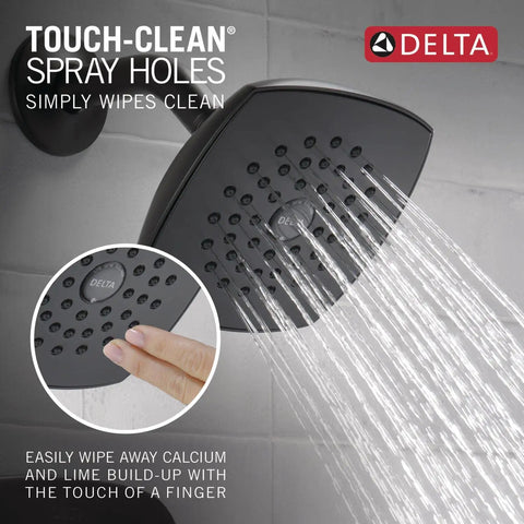 Modern Matte Black Tub and Shower Trim Kit With Single-Spray Touch-Clean Shower Head in use, water flowing, matte black finish.