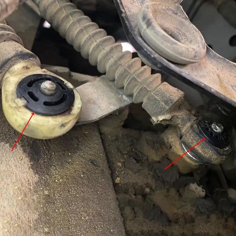 Close-up of installed 16mm and 22mm shift cable bushing kit for 5-speed manual transmissions fits Chrysler PT Cruiser 2001 2008 and Dodge Neon 2001 2008 gear shifter linkage repair replaces 5037380AA.