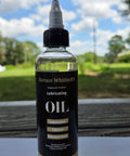 120 ml bottle of Rugged Industrial Lubricating Oil For Tools And Machinery With Rust Prevention displayed outdoors