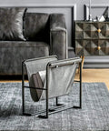 Heavy Duty Iron Magazine Rack With Durable Canvas Pockets Solid Floor Standing Organizer Built Tough Straight Up Nordic Minimalist Vibe in living room.