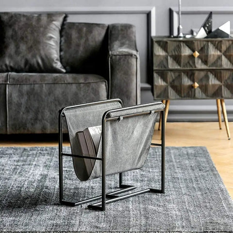 Heavy Duty Iron Magazine Rack With Durable Canvas Pockets Solid Floor Standing Organizer Built Tough Straight Up Nordic Minimalist Vibe in living room.