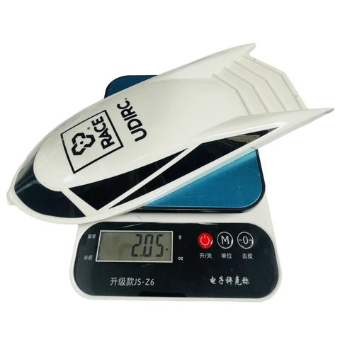 Beefed-Up Cabin Cover For UDI005-04 Arrow 5 RC Boat Parts Kit with UDI logo on weighing scale, weight shown as 205g.