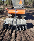 Tow Behind Notched Disc Harrow Attachment for ATV UTV 4 Ft Wide With 2 In Towball Hitch 14 In Concave Discs at work on soil