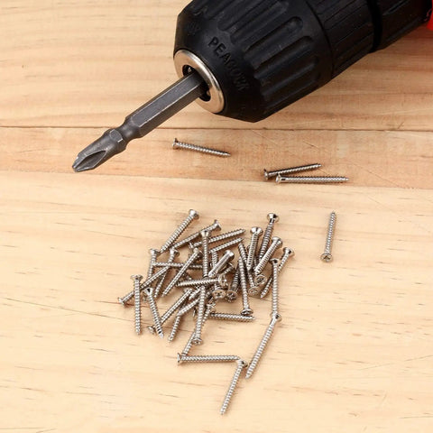 M2 Flat Head Self Tapping Screws Assortment Kit Featuring Nickel Plated Carbon Steel Build and driver on wood surface.
