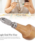 Single End Pin Vise with solid wood handle for precise jewelry making and crafting repairs in use.