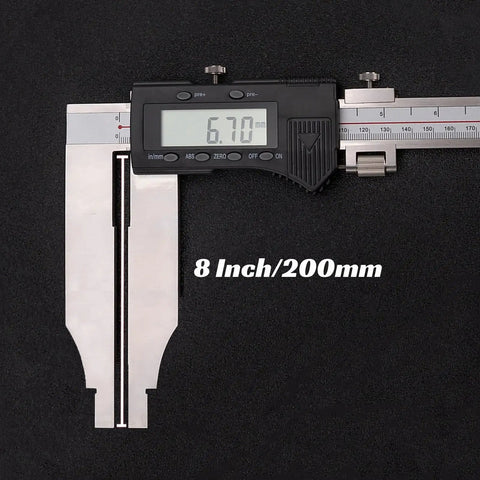 Built Tough Heavy Duty 40 Inch Digital Caliper With Extended Long Jaw For Deep Reach and Spot On Id Or Od Measurements In Metric And Imperial Units Featuring A Snappy Lcd Display with a measurement of 6.70mm shown.