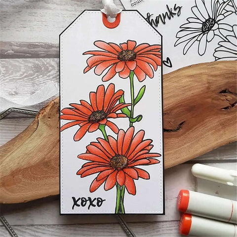 Cute Chamomile Silicone Clear Stamp And Die Set For Card Making And Scrapbooking tag with orange flowers and 'xoxo' text
