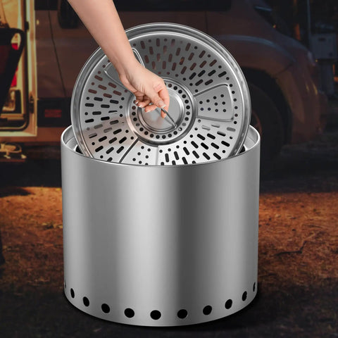 Hand placing the stainless steel dual-fuel pellet adapter into Bonfire fire pit, 17.3 inch extension upgrade, extends burn time.
