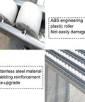 Close-up of ABS plastic rollers and stainless steel frame on Slick Four Row Abs Plastic Gravity Slide Conveyor With Stainless Steel Frame Easy Roll Unloading Pulley Smooth Operator For Warehouse Loading Dock Quick Fold Storage And No Sweat Freight Hauling Gear.