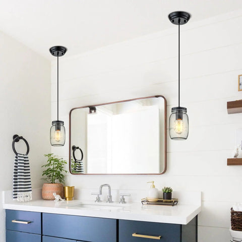Farmhouse Mason Jar Pendant Light Set For Kitchen Island with adjustable glass jar hanging lamps in a bathroom setting