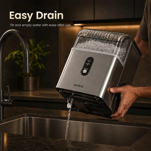 Top Tier Countertop Nugget Ice Maker Churns Out 35 Pounds Of Chewable Pebble Ice In Just Seven Minutes With Self Cleaning Design And Removable Basket For Everyday Chill Sessions In Silver draining into a sink.