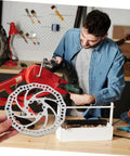 Heavy Duty Mechanical Disc Brake Set For Mountain Bike Front And Rear, Rock Solid Aluminum Brake Kit With 160mm Rotors displayed during installation.