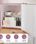 Inside view of the Slick 1.1 Cu Ft Compact Countertop Upright Freezer Featuring Smooth Temperature Dial And Handy Removable Shelf In Vibrant Pink.