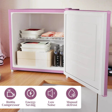 Inside view of the Slick 1.1 Cu Ft Compact Countertop Upright Freezer Featuring Smooth Temperature Dial And Handy Removable Shelf In Vibrant Pink.