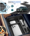 Hyundai Palisade 2026 Center Console Organizer Tray for 7 Seat Calligraphy Trim showing phone and gear storage compartment