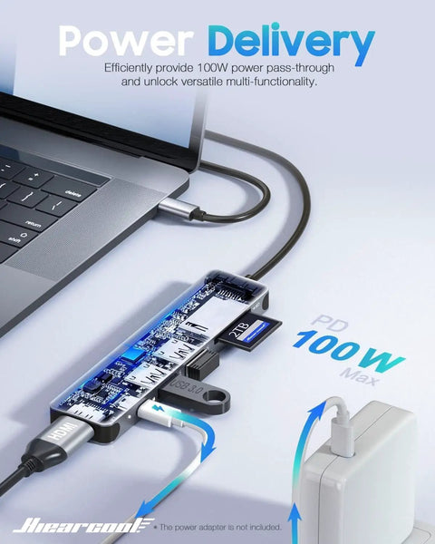 7 In 1 USB C Hub For MacBook And USB C Laptops With 4K HDMI 100W Power Delivery USB 3 0 Ports SD And TF Card Reader Space Gray Boss Level USB C Dock For Office Meetings Travel And Home Setup connected to laptop showing PD connection.