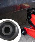 Top Shelf 62mm Floor Jack Rollers For 3 Ton Hydraulic Jacks With 20mm Mounting Holes on red floor jack next to close-up of rubber roller.