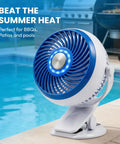 Blue Steel Portable Desk Fan With 360 Degree Oscillation near pool, showcasing dope active cooling technology for summer heat