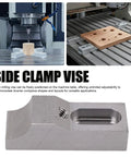 Low profile side clamp vise made from aluminum, suitable for CNC workholding. Perfect for tight grip on milling machine setups.